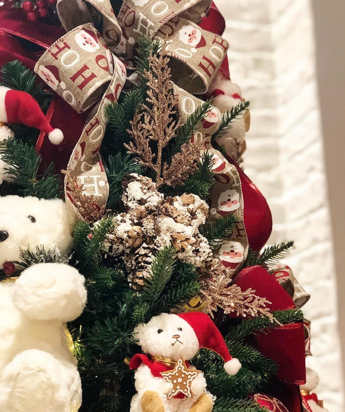 Teddy bear Christmas tree ribbon and ornament detail by Decor Galore